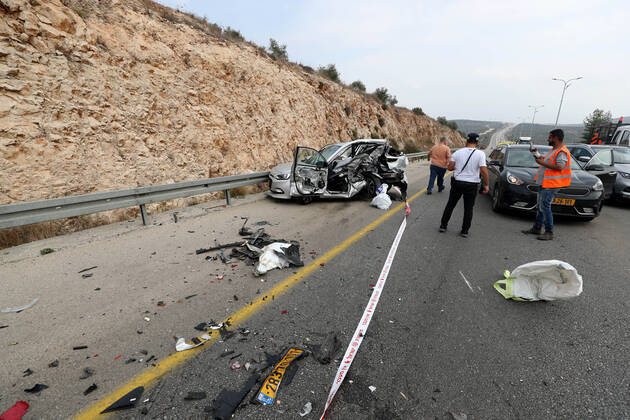 (221115) -- ARIEL, Nov. 15, 2022 -- People are seen at the scene of an attack near the Israeli settlement of Ariel in the West Bank, on Nov. 15, 2022. A Palestinian man killed three Israelis and wounded three others in an attack on Tuesday in the West Bank before being shot dead by Israeli forces, Israeli military and medics said. (Photo by Xinhua) MIDEAST-ARIEL-ATTACK MuammarxAwad