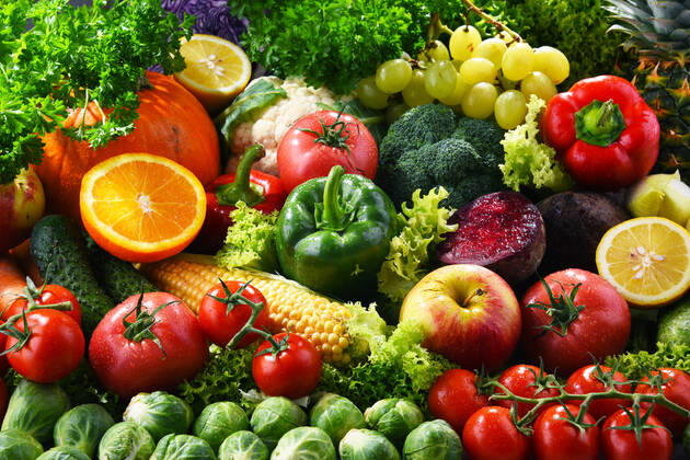 Composition with variety of fresh organic vegetables and fruits Composition with variety of fresh organic vegetables and fruits Copyright: xZoonar.com monticellox 18730654