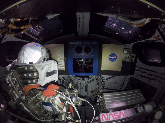 This high-resolution image, taken on November 16, 2022, captures the inside of the Orion crew module on flight day one of the Artemis I mission. At left is Commander Moonikin Campos, a purposeful passenger equipped with sensors to collect data that will help scientists and engineers understand the deep-space environment for future Artemis missions. At the center is the Callisto payload, a technology demonstration of voice-activated audio and video technology from Lockheed Martin in collaboration with Amazon and Cisco. Callisto could assist future astronauts on deep-space missions. Below and to the right of Callisto is the Artemis I zero-gravity indicator, astronaut Snoopy. Artemis I, the first spaceflight in NASA s Artemis program, successf  WAX2022112002 NASA