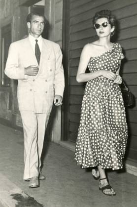 The Shah of Iran Mohammad Reza Pahlavi and Empress Soraya Esfandiary-Bakhtiary strolling in the street, Rome, Italy 1960 