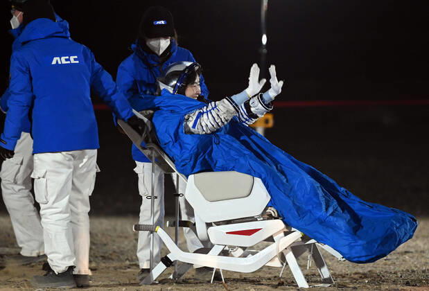 (221204) -- DONGFENG LANDING SITE, Dec. 4, 2022 -- Astronaut Liu Yang is out of the return capsule of the Shenzhou-14 manned spaceship at the Dongfeng landing site in north China s Inner Mongolia Autonomous Region, Dec. 4, 2022. The return capsule of the Shenzhou-14 manned spaceship, carrying astronauts Chen Dong, Liu Yang and Cai Xuzhe, touched down at the Dongfeng landing site safely on Sunday. ) (EyesonSci)CHINA-SHENZHOU-14-RETURN (CN) LianxZhen 