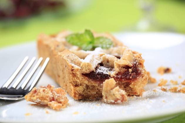 RECORD DATE NOT STATED Mini dessert pie with fruit filling , 21797436.jpg, closeup, plate, baked, British cuisine, food, one, treat, snack, confectionery, bar, cookie, cake, mincemeat, jelly, preserve, crostata, crust pastry, shortbread, lattice, small, mini, sweet, dessert, marmalade, jam, Christmas pie, filling, fruit, tart, mince pie,