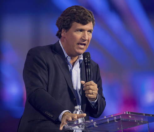 December 17, 2022 - Phoenix, Arizona, USA - Fox News host TUCKER CARLSON speaks at Turning Point USA s AmericaFest 2022. Phoenix USA - ZUMAce6_ 20221217_zaf_ce6_009 Copyright: xBrianxCahnx