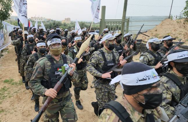 Militants of Al-Ansar Brigades, the military wing of the Palestinian al-Ahrar movement, participates in a military exercise, in Khan Younis in the southern of Gaza strip Militants of Al-Ansar Brigades, the military wing of the Palestinian al-Ahrar movement, participates in a military exercise, in Khan Younis in the southern of Gaza strip on January 01, 2023. Photo by Ashraf Amra apaimages Khan Younis Gaza Strip Palestinian Territory 010123_KHANYOUNIS_ASH_1_00 (3) Copyright: xapaimagesxAshrafxAmrax xapaimagesx
