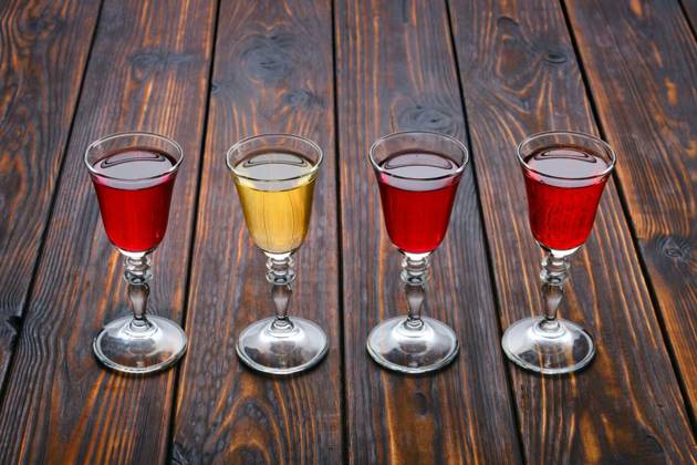  Vodka infused with berries, Vodka infused with berries on wooden background (photo with shallow depth of field), Vodka infused with berries on wooden background (photo with shallow depth of field), 03.10.2022, Copyright: xBoomeartx Panthermedia32167099.jpg