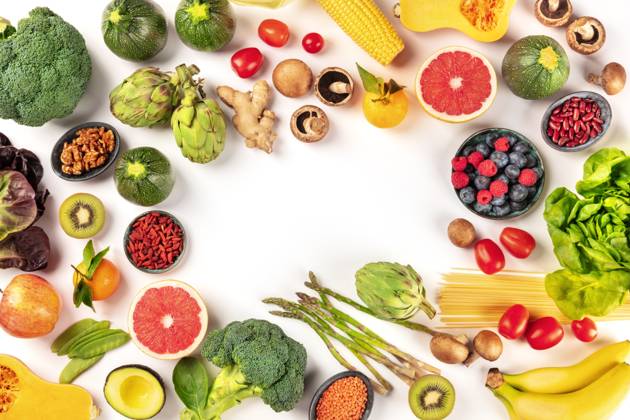 Vegan food. Healthy diet concept. Fruits, vegetables, pasta, nuts, legumes, mushrooms, shot from the top on a white background, forming a frame with a place for text. A flat lay composition Vegan food. Healthy diet concept. Fruits, vegetables, pasta, nuts, legumes, mushrooms, shot from the top on a white background, forming a frame with a place for text. A flat lay composition Copyright: xZoonar.com KaterinaxSolovyevax 14749811