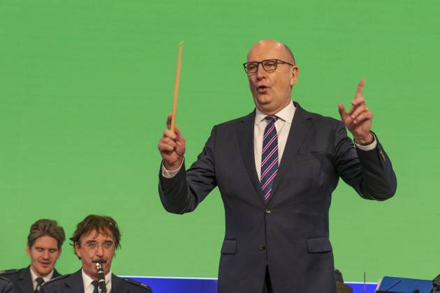 The Brandenburg Minister President Dietmar Woidke conducts the Brandenburg Police Orchestra with the Brandenburg anthem Märkische Heide, märkischer Sand at the Brandenburg Day in the Brandenburg Hall at the 87 International Green Week at the exhibition grounds in Berlin Charlottenburg The International Green Week is the worlds largest trade fair