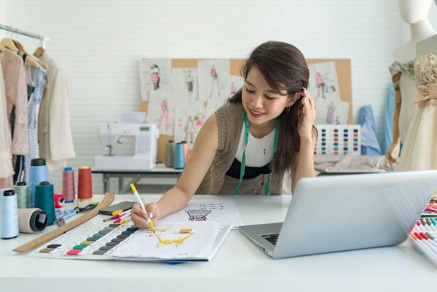  Young fashion designer use magic pen painting on pattern for cloth. Sewing Machine and various sewing related items are on the table. Asian woman working in home base cloth design business., Young fashion designer use magic pen painting on pattern for cloth. Sewing Machine and various sewing related items are on the table. Asian woman working in home base cloth design business., Young fashion designer use magic pen painting on pattern for cloth. Sewing Machine and various sewing related items are on the table. Asian woman working in home base cloth design business. model released, Symbolfoto property released , 06.01.2023, Copyright: xchadchaix Panthermedia33433707.jpg