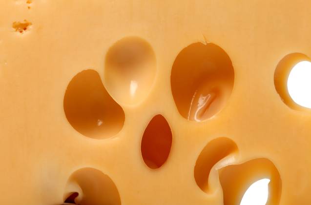 Slice of cheese close-up view Copyright: xGannaxPoltoratskax xDesignxPicsx , 31928254 Copyright: stelianxporojnicux xDesignxPics 31928254