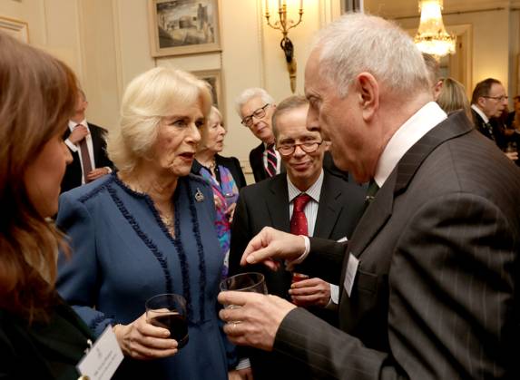 . 23 02 2023. London, United Kingdom. Camilla, Queen Consort, talks to Gyles Brandreth at a reception to celebrate the second anniversary of The Reading Room at Clarence House in London. The Reading Room, which was official launched by the Queen Consort two years ago, champions literacy and encourages readers to find new literature.  xPoolx xi-Imagesx IIM-24174-0027