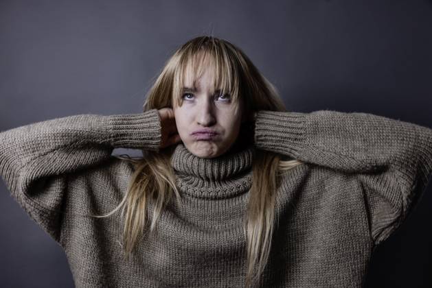Boy Woman with long, blonde Hair and eimem Wollpullover interlaced Arms behind the Head and forgiven the Face, Portrait, Studio recording Copyright: imageBROKER/JanxTepass ibxjte09036797.jpg ,model released, Symbolfoto ,property released