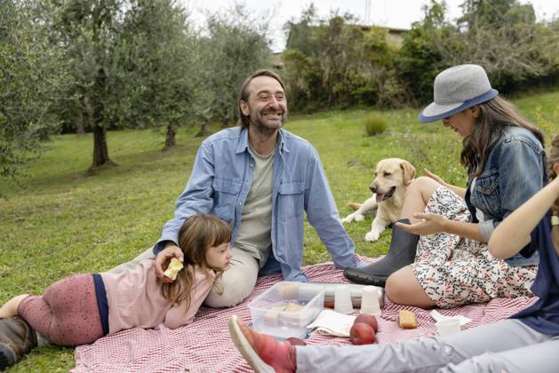 Happy family together having picnic on field model released, Symbolfoto property released, EIF04210
