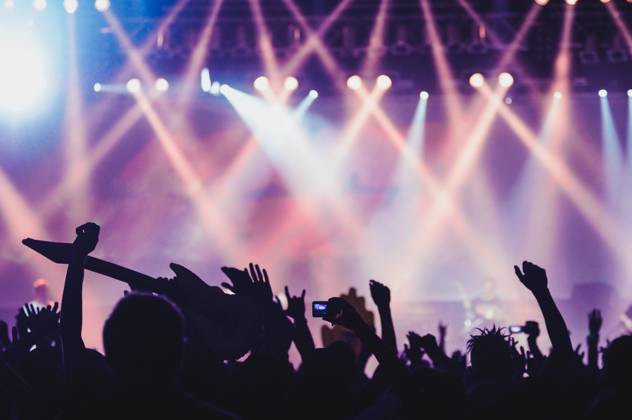 People on dance floor RobertKohlhuber_ConcertCrowdsDuringMusicFestivals_16 Copyright: xRobertxKohlhuberx Model Released