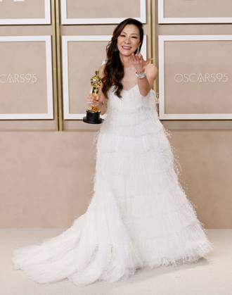 Michelle Yeoh, winner of the award for Best Actress in a Leading Role for Everything Everywhere All at Once, appears backstage with her Oscar during the 95th annual Academy Awards at Loews Hollywood Hotel in the Hollywood section of Los Angeles on Sunday, March 12, 2023.  LAP20230312287 JOHNxANGELILLO