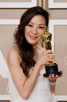 Michelle Yeoh, winner of the award for Best Actress in a Leading Role for Everything Everywhere All at Once, appears backstage with her Oscar during the 95th annual Academy Awards at Loews Hollywood Hotel in the Hollywood section of Los Angeles on Sunday, March 12, 2023.  LAP20230312284 JOHNxANGELILLO