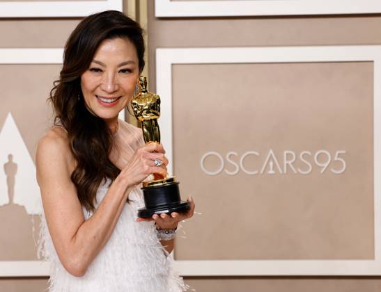 Michelle Yeoh, winner of the award for Best Actress in a Leading Role for Everything Everywhere All at Once, appears backstage with her Oscar during the 95th annual Academy Awards at Loews Hollywood Hotel in the Hollywood section of Los Angeles on Sunday, March 12, 2023.  LAP20230312285 JOHNxANGELILLO