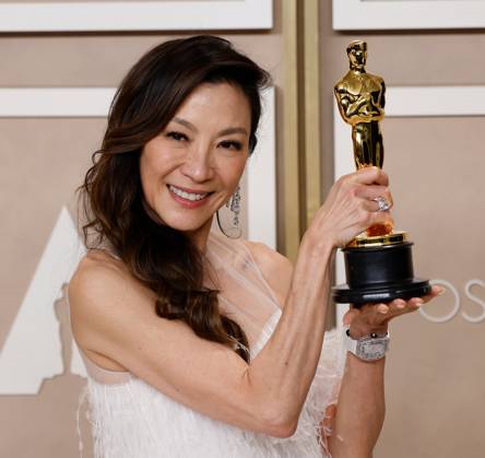 Michelle Yeoh, winner of the award for Best Actress in a Leading Role for Everything Everywhere All at Once, appears backstage with her Oscar during the 95th annual Academy Awards at Loews Hollywood Hotel in the Hollywood section of Los Angeles on Sunday, March 12, 2023.  LAP20230312289 JOHNxANGELILLO