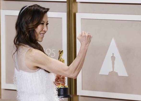 Michelle Yeoh, winner of the award for Best Actress in a Leading Role for Everything Everywhere All at Once, appears backstage with her Oscar during the 95th annual Academy Awards at Loews Hollywood Hotel in the Hollywood section of Los Angeles on Sunday, March 12, 2023.  LAP202303125011 JohnxAngelillo