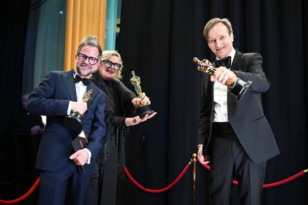 Ernestine Hipper and Christian M. Goldbeck pose backstage with the OscarÂ® for Production Design and Volker Bertelmann poses with the OscarÂ® for Original Score during the live ABC telecast of the 95th OscarsÂ® at the DolbyÂ® Theatre at Ovation Hollywood on Sunday, March 12, 2023.  Copyright: xA.M.P.A.S.x 34494-540PLX