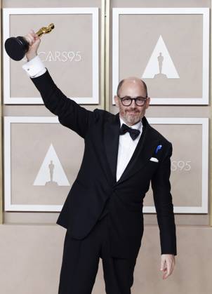 Edward Berger, winner of the award for Best International Feature Film for All Quiet on the Western Front, appears backstage with his Oscar during the 95th annual Academy Awards at Loews Hollywood Hotel in the Hollywood section of Los Angeles on Sunday, March 12, 2023.  LAP202303128125 JohnxAngelillo