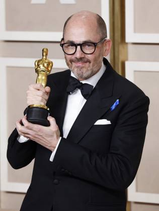 Edward Berger, winner of the award for Best International Feature Film for All Quiet on the Western Front, appears backstage with his Oscar during the 95th annual Academy Awards at Loews Hollywood Hotel in the Hollywood section of Los Angeles on Sunday, March 12, 2023.  LAP202303128129 JohnxAngelillo