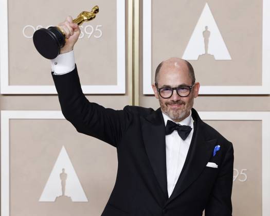 Edward Berger, winner of the award for Best International Feature Film for All Quiet on the Western Front, appears backstage with his Oscar during the 95th annual Academy Awards at Loews Hollywood Hotel in the Hollywood section of Los Angeles on Sunday, March 12, 2023.  LAP202303128124 JohnxAngelillo
