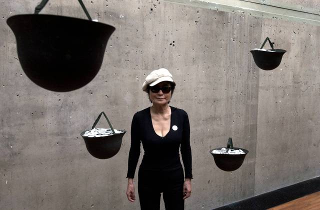 STOCKHOLM 20040528 Yoko Ono gives a press preview of her exhibition at Kulturhuset Multimedia artist Yoko Onos exhibition Remember Love opens to the public on Saturday, May 29th Image The artwork Whisper Piece Helmets consisting of upside-down soldier helmets containing buttons with different texts that visitors are invi  Copyright: xAndersxWiklundx xTTx 50030