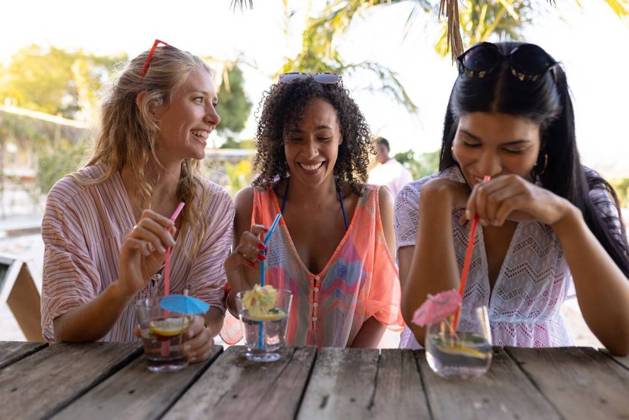 Happy diverse friends having party at beach, drinking cocktails Happy diverse friends having party at beach, drinking cocktails. Spending quality time, lifestyle, friendship, summertime and vacation concept., model released, , property released, Cape Town, South Africa, 21.02.2023, 3976719.jpg, people,happy,diverse,friend,beach,drinking,cocktail,spending,quality time,lifestyle,party,friendship,summertime,vacation,concept,young,holiday,fun,sea,ocean,leisure,summer,person,happiness,coast,beautiful,together,adult,sand,travel,cheerful,smile,water,friends,quality,time Young Adult,Woman,Female,White,Black,Multiracial