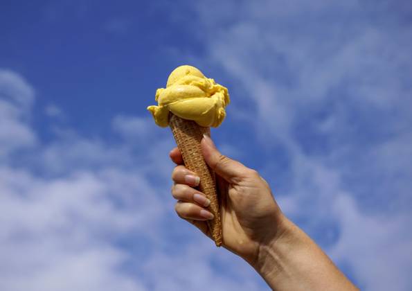 27 04 2023, Ice cream cone with mango ice cream from an Allgäu ice cream parlor 27 04 2023, Ice cream cone 27 04 2023, Ice cream cone