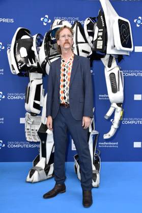 Uke Bosse with Gamescom Bot at the award ceremony of the German Computer Game Award 2023 at Spindler Klatt Berlin, 11 05 2023 Foto:xN.xKubelkax xFuturexImage