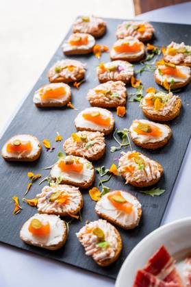 Food from a Salmon skewer Event Wedding dinner and Buffet Celebration Or Party, Dinner and Food at a Black people Chalkboard Copyright: imageBROKER/UnaixHuizi ibxuhu09317000