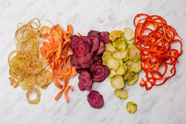Dehydrated vegetables heap isolated on white as a snack for vegetarians Dehydrated vegetables heap isolated on white background Copyright: xZoonar.com OKSANAxSHUFRYCHx 17317286