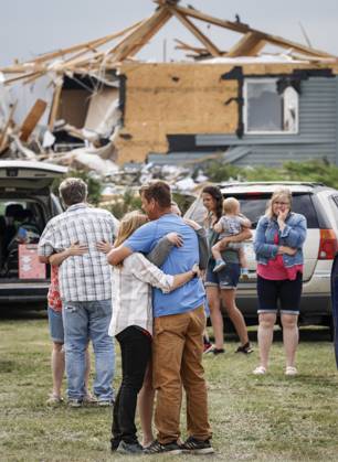 July 1, 2023, Carstairs, AB, CANADA: People embrace after a tornado damaged homes near Carstairs, Alta., Saturday, July 1, 2023. No injuries were reported. Carstairs CANADA  - ZUMAc35_ 20230701_zaf_c35_142 Copyright: xJeffxMcintoshx