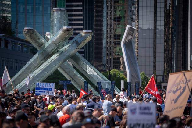 July 9, 2023, VANCOUVER, BC, CANADA: Striking port workers from the International Longshore and Warehouse Union Canada hold large letters while attending a rally in Vancouver, on Sunday, July 9, 2023. VANCOUVER CANADA  - ZUMAc35_ 20230709_zaf_c35_036 Copyright: xEthanxCairnsx