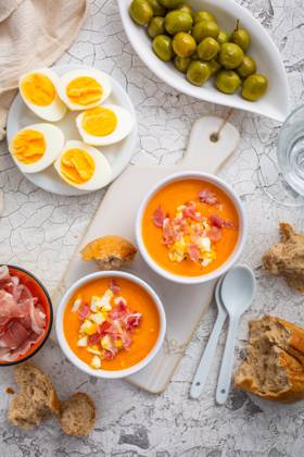 Salmorejo - raw tomato soup with ingredients on a kitchen table Salmorejo - raw tomato soup with ingredients on a kitchen table, spanish cuisine for hot summer Copyright: xZoonar.com IngridxBalabanovax 20479799