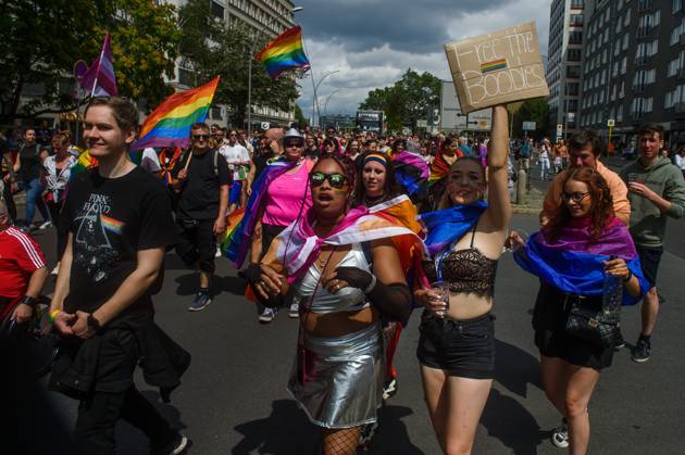 July 22, 2023, Berlin, Germany: People march with pride flags and a placard during the pride parade. Berlin Christopher Street Day (CSD Berlin) or Berlin Pride Parade is an annual demonstration in Berlin for the rights of LGBT+ people. Berlin Germany - ZUMAs197 20230722_zab_s197_060 Copyright: xYauhenxYerchakx