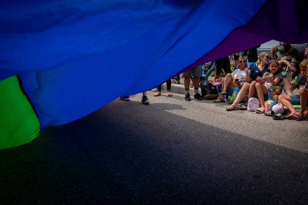 August 6, 2023, VANCOUVER, BC, CANADA: People watch as the Pride Parade passes at English Bay in Vancouver, B.C., Sunday, Aug. 6, 2023. VANCOUVER CANADA  - ZUMAc35_ 20230806_zaf_c35_016 Copyright: xEthanxCairnsx