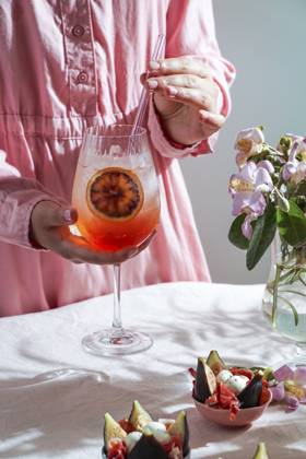 aperol spritz cocktail, on a pale pink linen tablecloth, shadows, sunlight, summer drink in glass aperol spritz cocktail, on a pale pink linen tablecloth, shadows, sunlight, summer drink in glass Copyright: xJuliaxBogdanovax JBO310723-18