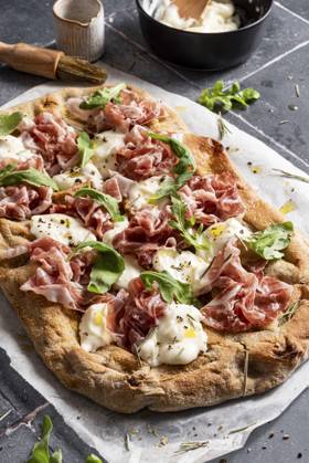 Pizza with prosciutto, arugula, cheese and olive oil Pizza with prosciutto, arugula, cheese and olive oil Copyright: xSoniaxBozzox SBO310723-29