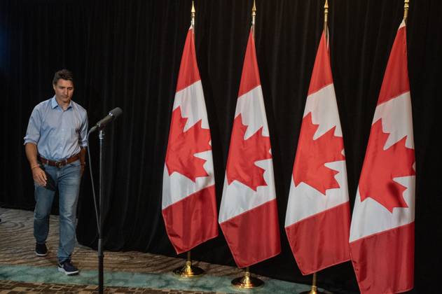 August 20, 2023, Charlottetown, PE, CANADA: Prime Minister Justin Trudeau walks to the microphone to make a statement about the wildfires in Western Canada in Charlottetown, Sunday, Aug. 20, 2023. He and the rest of his cabinet is in the city for a retreat beginning Monday. Charlottetown CANADA  - ZUMAc35_ 20230820_zaf_c35_039 Copyright: xBrianxMcinnisx
