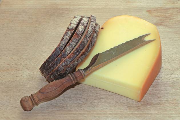 Popular cheese products Middle Ages Gouda in one piece with strong mixed rye bread from the Netherlands
