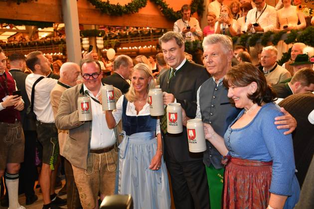Markus Söder Prime Minister of Bavaria and Dieter Reiter Mayor of Munich with wives meadows opening 2023 tapping Schottenhammel Theresienwiese Munich 16 September 2023