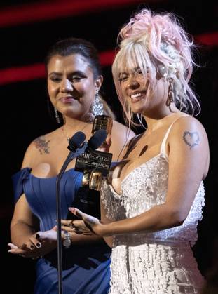 Karol G receives an award at the 2023 Latin Billboard Music Awards at the University of Miami, Watsco Center, Thursday, October 05, 2023 in Coral Gables, Florida.  MIA20231005193 GARYxIxROTHSTEIN