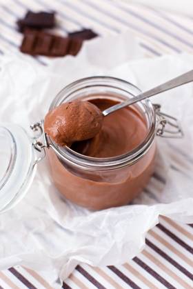 Chocolate dessert in a glass jar Copyright: Crestock 32109204