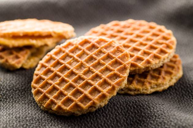 Sweet waffle biscuits. Sweet waffle biscuits on tablecloth. Copyright: xZoonar.com JIRIxHERAx 13559329