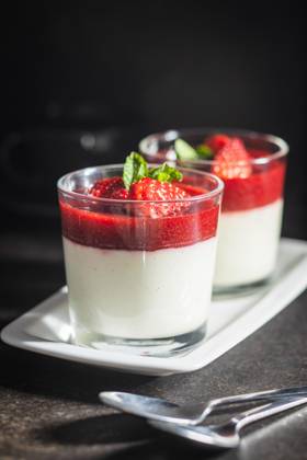 Italian dessert panna cotta with strawberries Italian dessert panna cotta in glass with strawberries. Copyright: xZoonar.com JIRIxHERAx 15217672