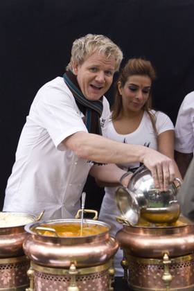 Gourmet king Gordon Ramsay cooks up a curry, with the help of Coronation Street actress Shobna Gulati, on a pop-up stall in London in aid of Comic Relief 50815, LONDON, UNITED KINGDOM -Friday February 4 2011. Gourmet king Gordon Ramsay cooks up a curry with the help of Coronation Street actress Shobna Gulati on his pop-up stall in Brick Lane in aid of Red Nose Day. The TV Chef is working with Comic Relief on a range of their Seriously Good Indian sauces where Comic Relief get at least 10p from the sale of each jar. VIDEO AVAILABLE Photograph: Ringo, PacificCoastNews.com UK OFFICE:+44 131 557 7760 7761 US OFFICE:1 310 261 967  Copyright: xRingo,xPacificCoastNews.comx xAvalonx 0524780637