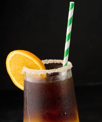 Iced coffee with orange juice in a transparent glass, refreshing bumble coffee on the table Iced coffee with orange juice in a transparent glass, refreshing bumble coffee on the table Copyright: xZoonar.com DANKOxNx 20465806