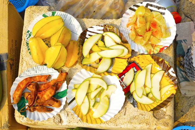 Sliced Konkani fruit like tamarind, amla or Indian gooseberry, raw mango and Star Fruit or Carambola for sale at Nagaon beach, Maharashtra, India, India Sliced Konkani fruit like tamarind, amla or Indian gooseberry, raw mango and Star Fruit or Carambola for sale at Nagaon beach, Maharashtra, India Copyright: xZoonar.com RealityImagesx 20716894