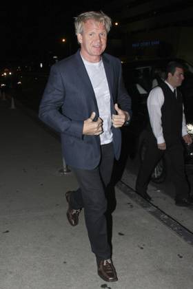 Chef Gordon Ramsay leaves BOA Steak House in West Hollywood after dining with friends 62774, LOS ANGELES, CALIFORNIA - Wednesday June 15th 2011. Chef Gordon Ramsay leaves BOA Steak House in West Hollywood - making a sad face and holding his stomach! This turned to smiles as he neared his waiting car, after dining with friends. , Credit:David Tonnessen Avalon USA, West Hollywood  Copyright: xDavidxTonnessenx xAvalonx 0525199219